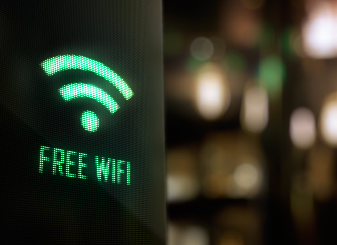 A lit up sign explains that there is free wifi available