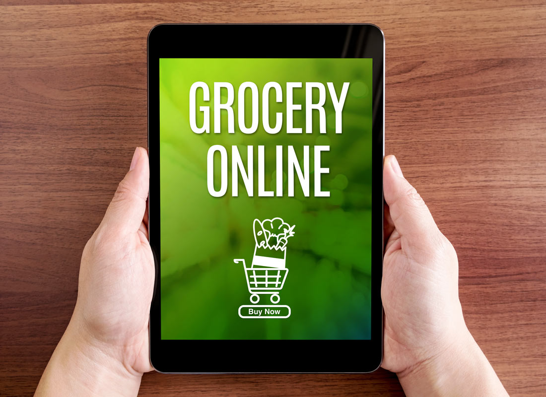 A handheld device shows the ability to do grocery shopping at the touch of a finger