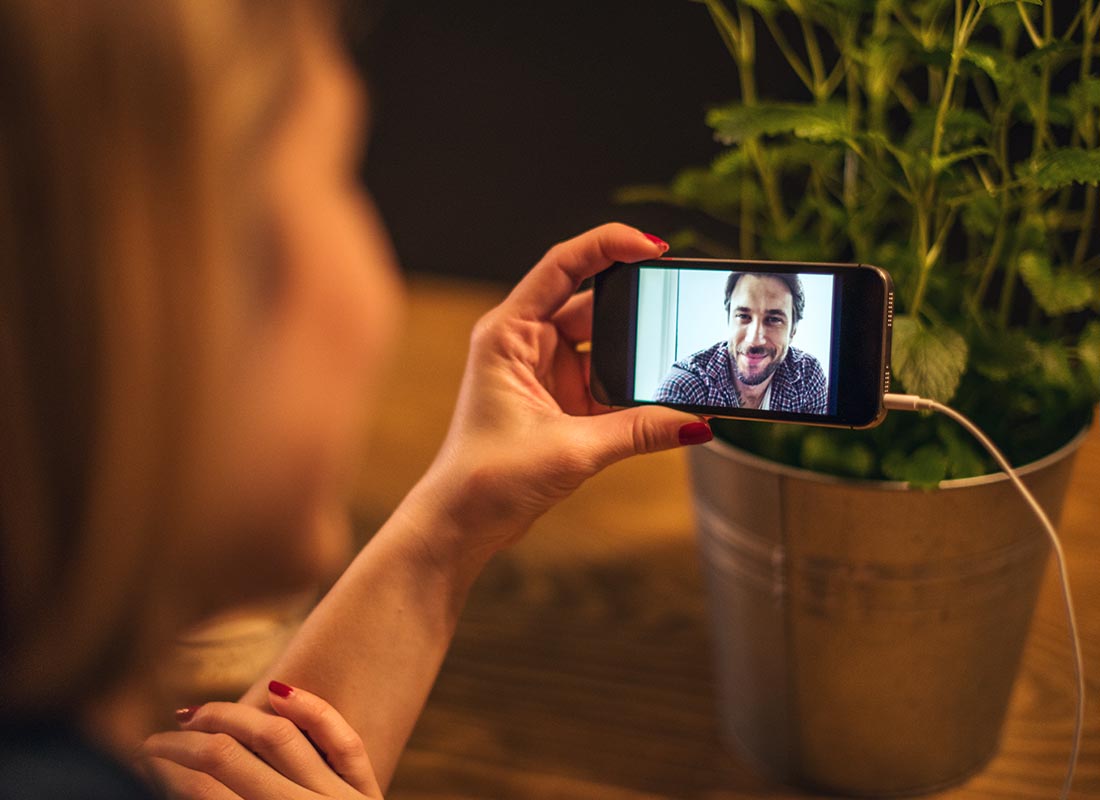 A couple connecting over WhatsApp