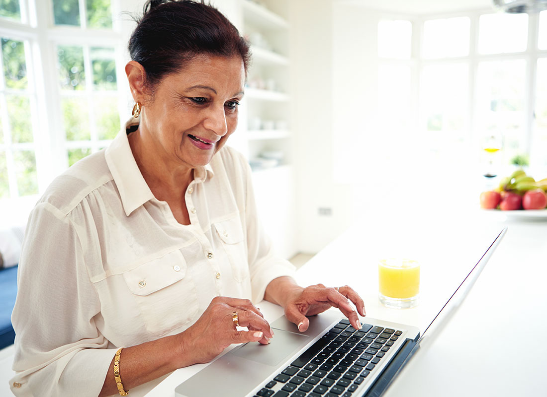 Getting online banking done in a jiffy with a laptop computer.