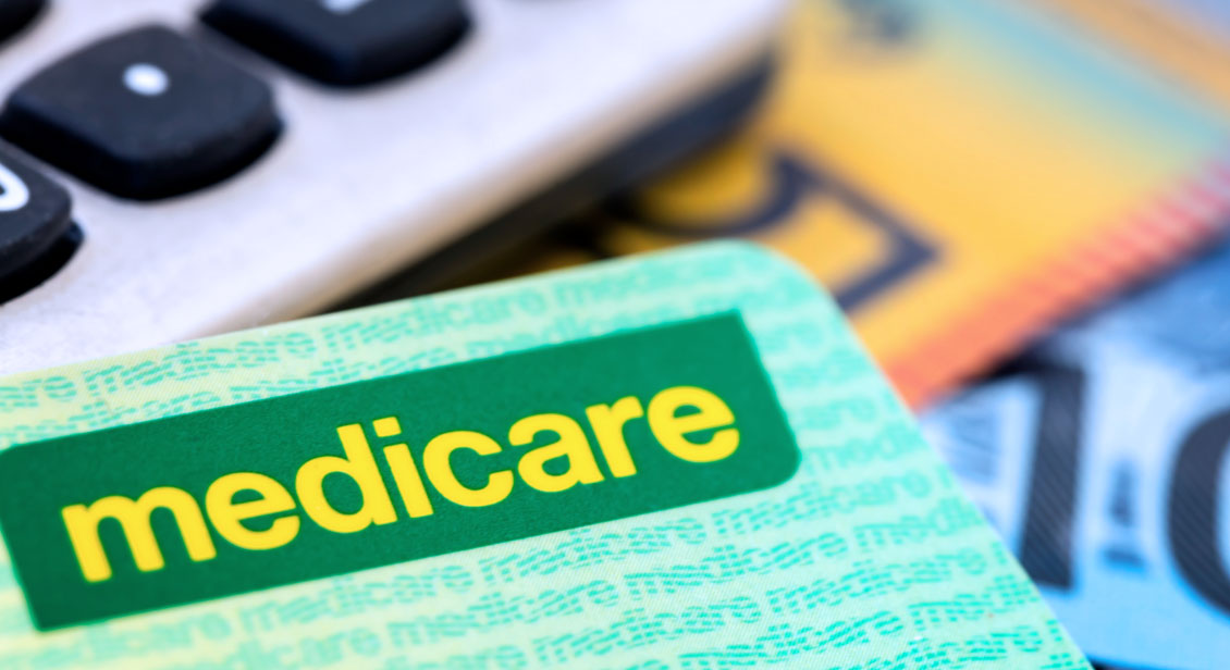 Green coloured Medicare card