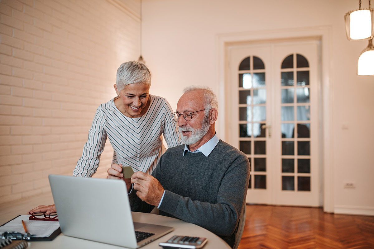 A couple shopping online together.