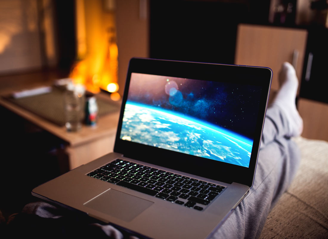 Relaxing at home with a laptop computer