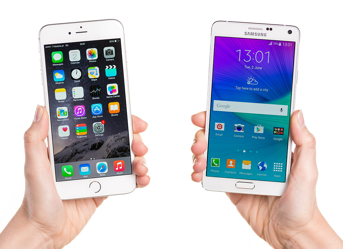 An Apple iPhone and an Android smartphone side by side