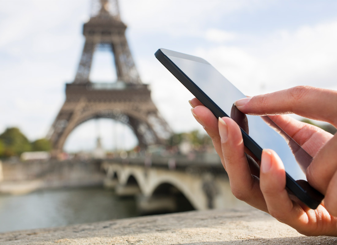 A mobile phone calling home from Paris