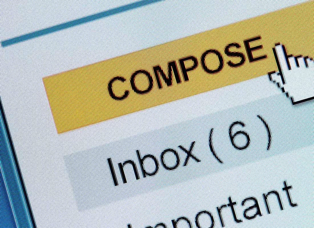 A zoomed-in view of someone typing an email on their device