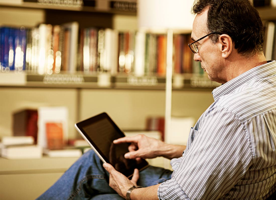 A relaxing evening reading the news on a tablet device