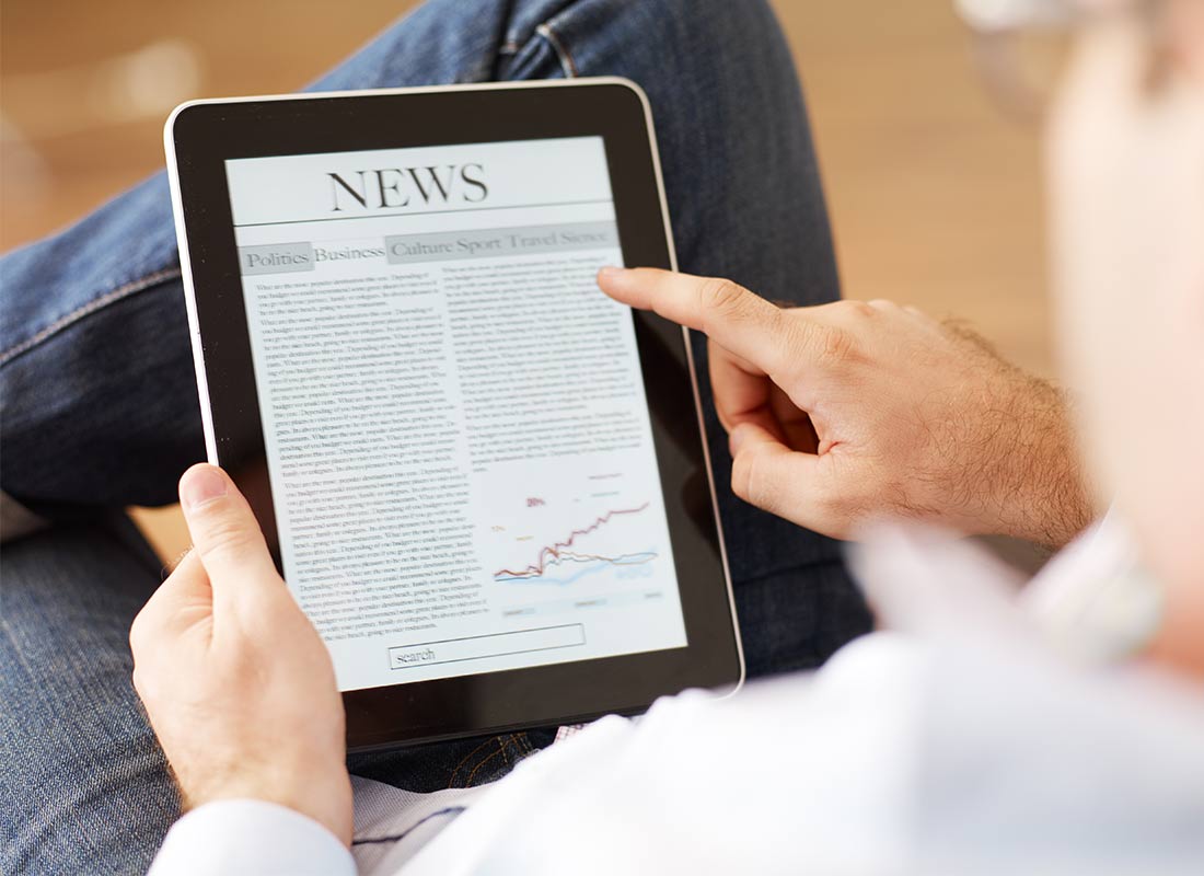 Reading the news while enjoying a break in a cafe is a pleasant way to stay up to date