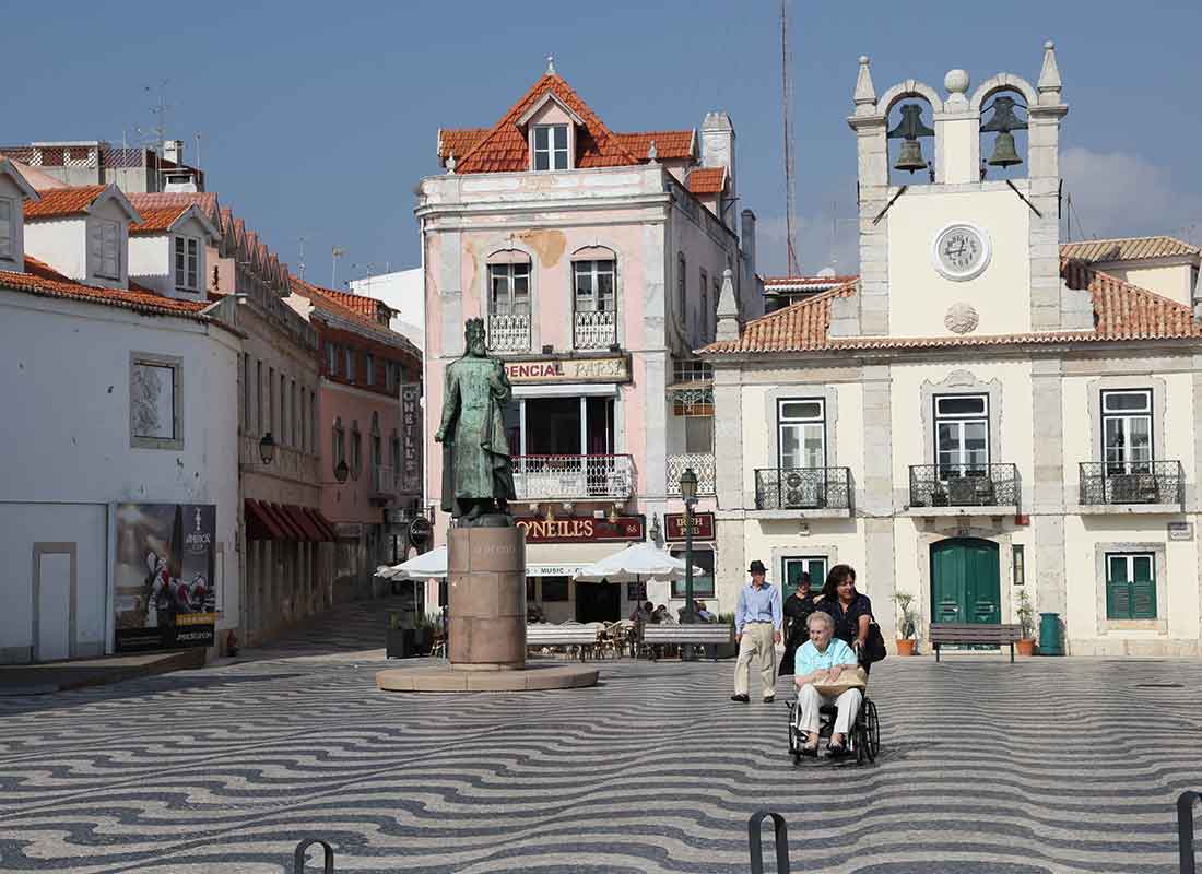 An old town square with a town hall in Europe or South America.