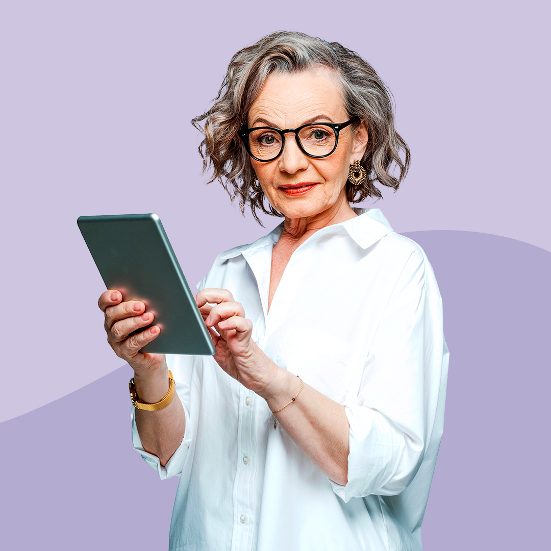 Knowledgeable older woman holding a tablet