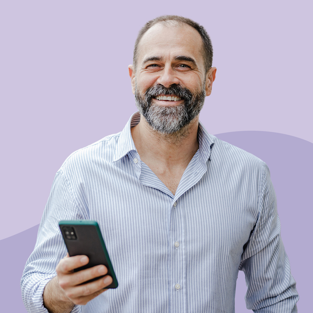 A man using am Apple iPhone